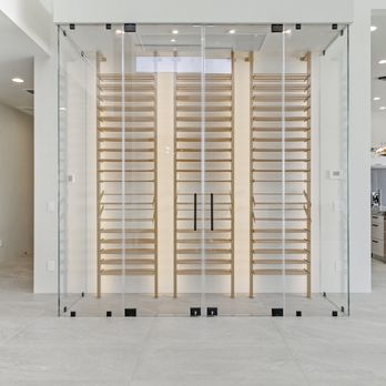 Shower Door Pros - Clear Starfire glass wine cellar enclosure, tightly sealed for temperature control capabilities. - Glass & Mirrors Near Me - Phoenix, Arizona Shower Door Pros - Clear Starfire glass wine cellar enclosure, tightly sealed for temperature control capabilities. - Glass & Mirrors Near Me - Phoenix, Arizona