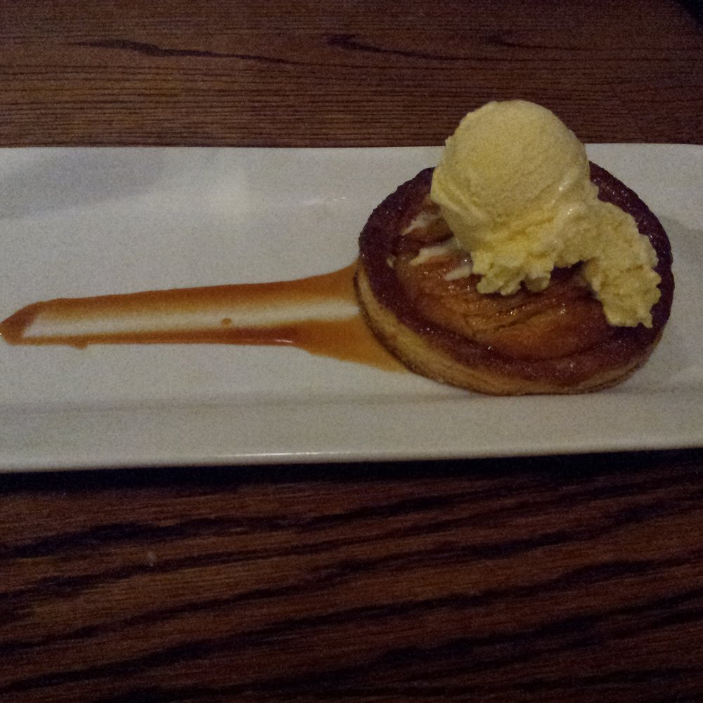 Chives Restaurant - Apple Frangipine with homemade vanilla ice cream - New American Near Me - Suamico, Wisconsin Chives Restaurant - Apple Frangipine with homemade vanilla ice cream - New American Near Me - Suamico, Wisconsin