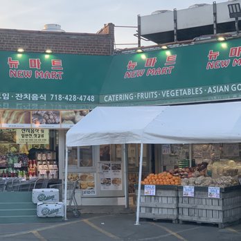 New Mart - View from back parking lot where snack shop is located - Grocery Near Me - New York, New York New Mart - View from back parking lot where snack shop is located - Grocery Near Me - New York, New York