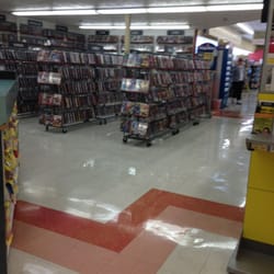 Large movie rental section next to customer service! Decent prices!