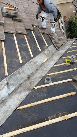 Slide of All American Roofing and Seamless Gutters