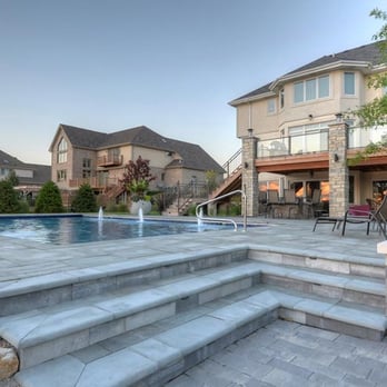 Elemental Landscapes - an outdoor pool and patio - Landscaping Near Me - New Lenox, Illinois Elemental Landscapes - an outdoor pool and patio - Landscaping Near Me - New Lenox, Illinois