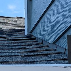 Blyss Construction - Roof flashing work.