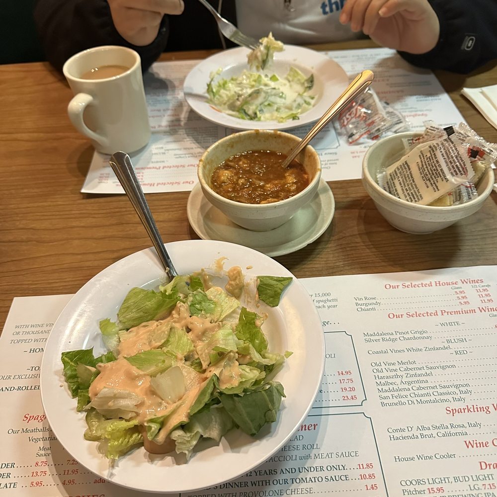Vince's Spaghetti - Soup and salad is included in the famous Vince's dinner. - Italian Near Me - Ontario, California Vince's Spaghetti - Soup and salad is included in the famous Vince's dinner. - Italian Near Me - Ontario, California