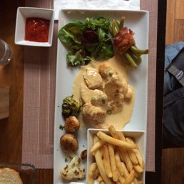 Chicken with a mushroom cream sauce. Chicken with a mushroom cream sauce.