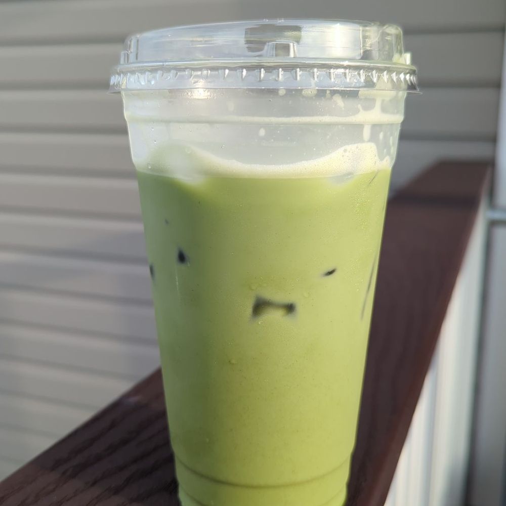 The Local Refillery - Iced Matcha Latte with Cardamom Rose syrup and house-made vanilla almond milk - Specialty Food Near Me - St. Augustine, Florida The Local Refillery - Iced Matcha Latte with Cardamom Rose syrup and house-made vanilla almond milk - Specialty Food Near Me - St. Augustine, Florida