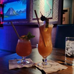 Wahi Hana - Pink Tide mocktail on left and Rum Runner on right