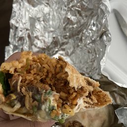 Chicken Burrito with lettuce, rice, sour cream, corn and beans (FANTASTIC!!) Chicken Burrito with lettuce, rice, sour cream, corn and beans (FANTASTIC!!)