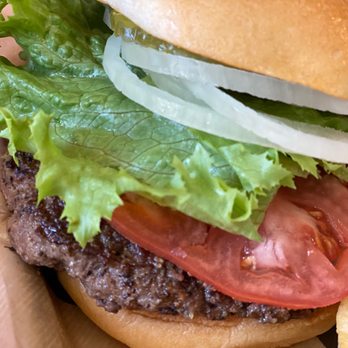 Lucy's Big Burgers - Close up on a Lucy Burger at Lucys Big Burgers in Abilene, Texas, USA. - Burgers Near Me - Abilene, Texas Lucy's Big Burgers - Close up on a Lucy Burger at Lucys Big Burgers in Abilene, Texas, USA. - Burgers Near Me - Abilene, Texas