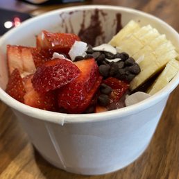 a bowl of fruit and chocolate a bowl of fruit and chocolate