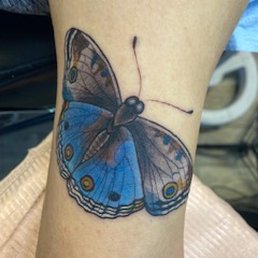 tattoo about the size of my palm on the inner bicep with my elbow toward the bottom.