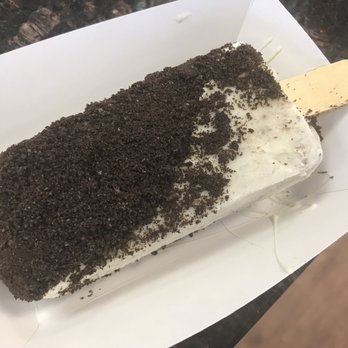 The Paleta Bar - Cookies and Creme Half-dipped in White Chocolate with Oreo Crumbles - Ice Cream & Frozen Yogurt Near Me - Albuquerque, New Mexico
