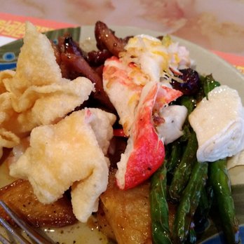 The Orchid Garden - a plate of food on a table - Chinese Near Me - Jena, Louisiana The Orchid Garden - a plate of food on a table - Chinese Near Me - Jena, Louisiana