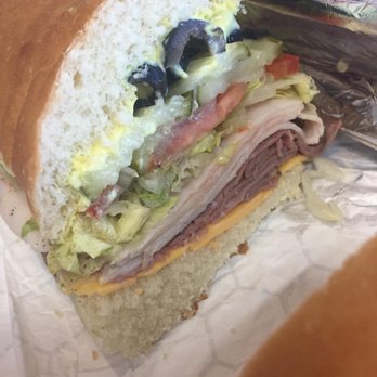 Getto Subs - a half eaten sandwich - Sandwiches Near Me - Fallon, Nevada