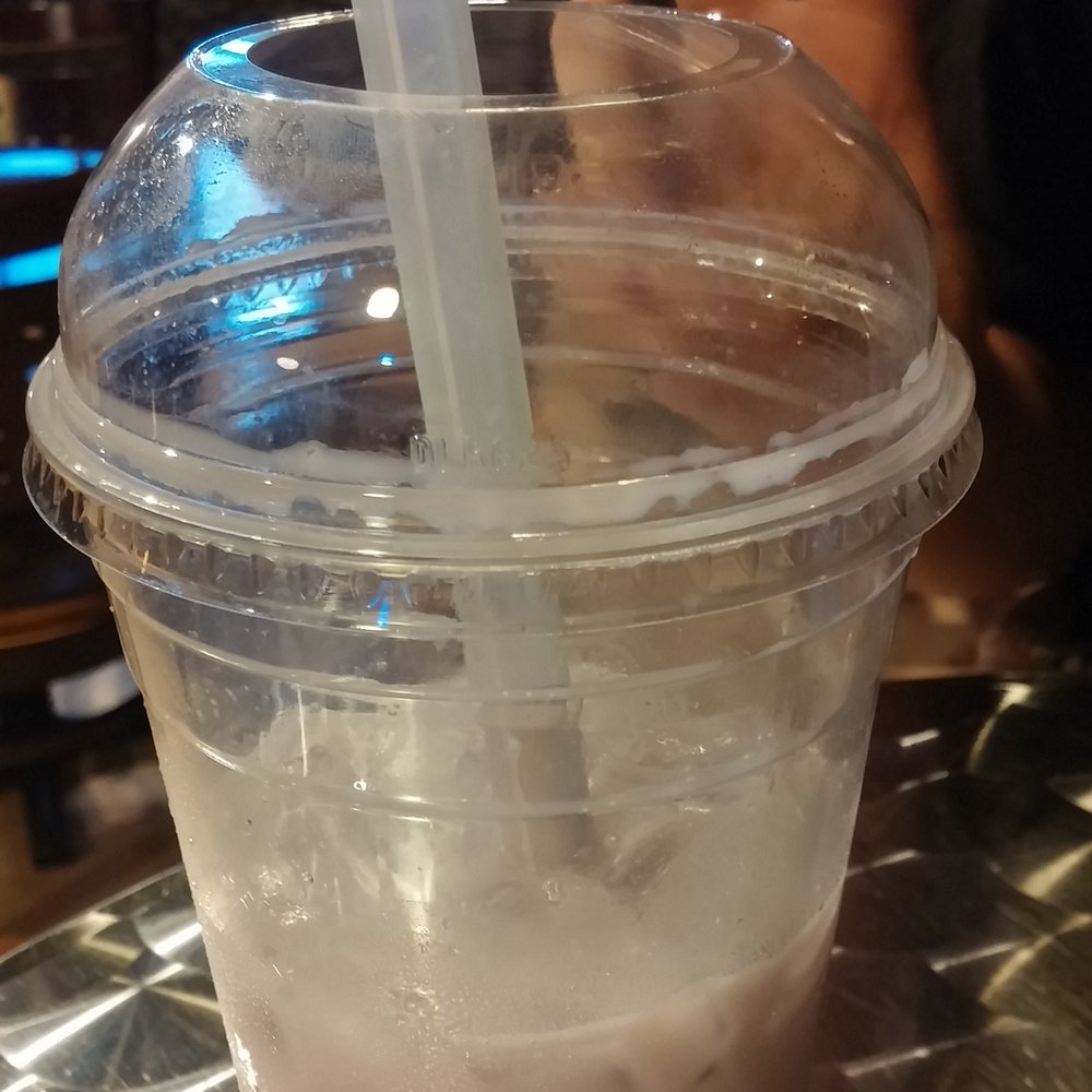 Tea Leaf Cafe - Almost finished Coconut Taro with bubbles and lychee jelly. - Coffee & Tea Near Me - Amherst, New York Tea Leaf Cafe - Almost finished Coconut Taro with bubbles and lychee jelly. - Coffee & Tea Near Me - Amherst, New York