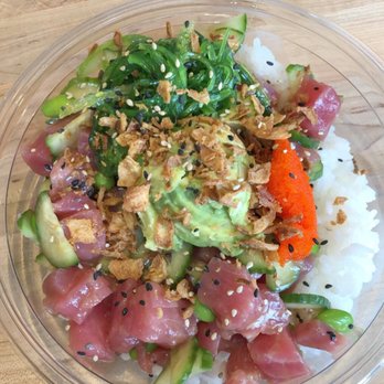 Pokeworks - Ahi tuna poke with cucumber, seaweed salad, masago, avocado ($1.50 extra), white rice, and onion crisps on top. - Poke Near Me - Webster, Texas Pokeworks - Ahi tuna poke with cucumber, seaweed salad, masago, avocado ($1.50 extra), white rice, and onion crisps on top. - Poke Near Me - Webster, Texas