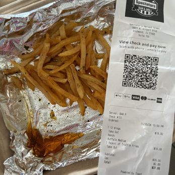 Spectators Bar & Grill - Oil with some Truffle "basket" of fries - Sports Bars Near Me - Richmond, Texas Spectators Bar & Grill - Oil with some Truffle "basket" of fries - Sports Bars Near Me - Richmond, Texas