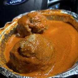Side of meatballs. Seasoning very good but wish they were fried before being cooked in sauce. The sauce 10/10