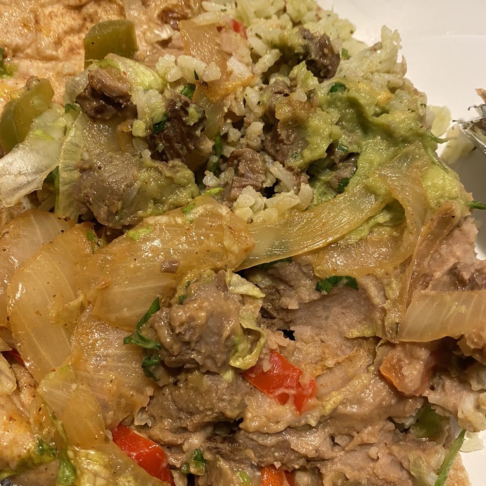 Freebirds World Burrito - a plate of food - Tex-Mex Near Me - Irving, Texas Freebirds World Burrito - a plate of food - Tex-Mex Near Me - Irving, Texas