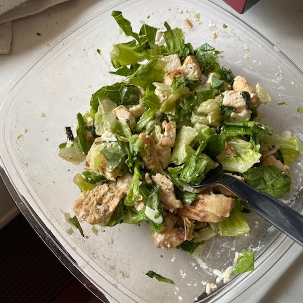 a salad in a plastic container a salad in a plastic container