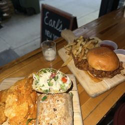 Earl's Beer & Cheese - The hot honey chicken sandwich in question (R), an equally good chicken caesar wrap (L), but this review isn't about her.