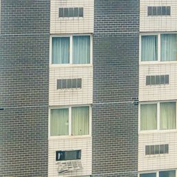 An AC guard about to fall off the 2nd floor An AC guard about to fall off the 2nd floor