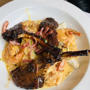 Papi Cuisine - Shrimp and grits with lamb chops - Cocktail Bars Near Me - Baltimore, Maryland