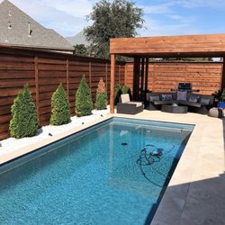 Texas Best Stain - Horizontal Board on Board Fence & Modern Patio Cover.