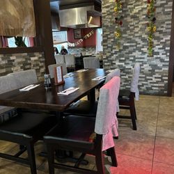 Sakada Japanese Steak House - They have the hibachi cook on table.  But haven't tried it.  The food is always great here.