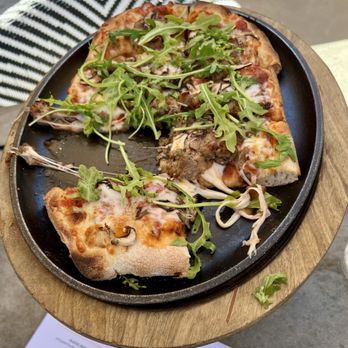Crawford's Social - Sausage and mushroom pizza minus two slices - Lounges Near Me - Westlake Village, California Crawford's Social - Sausage and mushroom pizza minus two slices - Lounges Near Me - Westlake Village, California
