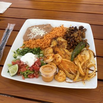 Mauricio’s Kitchen - fish, shimp, pork, rice and beans, grilled onions... - Mexican Near Me - Englewood, Florida Mauricio’s Kitchen - fish, shimp, pork, rice and beans, grilled onions... - Mexican Near Me - Englewood, Florida