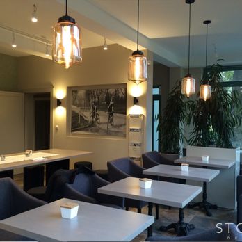 Stocki Design - We took the dining area of a hotel, adjacent to an 150 year old palace, and created a space that provides guests a comfortable arrangement. - Interior Design Near Me - Jersey City, New Jersey Stocki Design - We took the dining area of a hotel, adjacent to an 150 year old palace, and created a space that provides guests a comfortable arrangement. - Interior Design Near Me - Jersey City, New Jersey
