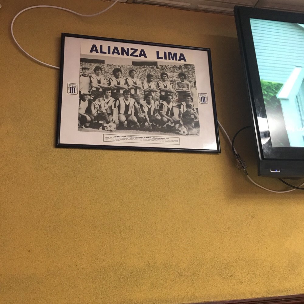 Rocky's Restaurant - a picture of a group of baseball players hanging on the wall - Latin American Near Me - Roselle Park, New Jersey Rocky's Restaurant - a picture of a group of baseball players hanging on the wall - Latin American Near Me - Roselle Park, New Jersey
