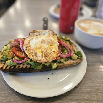 Millie's Cafe - Pasadena - Avocado toast with added egg - Breakfast & Brunch Near Me - Pasadena, California Millie's Cafe - Pasadena - Avocado toast with added egg - Breakfast & Brunch Near Me - Pasadena, California