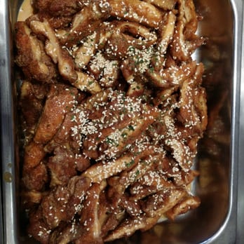 Grace Kitchen - a dish of meat with sesame sprinkled on top - Chinese Near Me - Brooklyn, New York