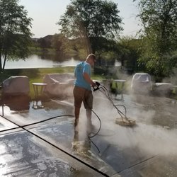 Bee Clean Pressure Wash - Ryan working his magic on my filthy patio
