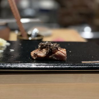 Zen Sushi Omakase - a close up of a plate of food - Sushi Bars Near Me - New York, New York Zen Sushi Omakase - a close up of a plate of food - Sushi Bars Near Me - New York, New York