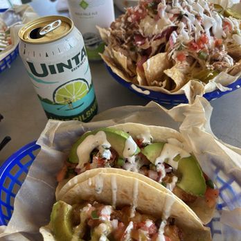 Shaka Taco - Beer-battered cod fish tacos and chicken nachos in the back. - Tacos Near Me - Surf City, North Carolina Shaka Taco - Beer-battered cod fish tacos and chicken nachos in the back. - Tacos Near Me - Surf City, North Carolina
