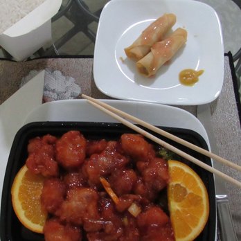 Wok N Roll II - My orange chicken, rice and yummy Spring Rolls. - Chinese Near Me - Ocala, Florida Wok N Roll II - My orange chicken, rice and yummy Spring Rolls. - Chinese Near Me - Ocala, Florida
