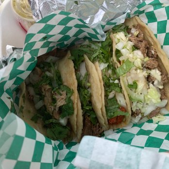 Taco Time Mexican Grill - a hand holding a taco - Mexican Near Me - Tavares, Florida Taco Time Mexican Grill - a hand holding a taco - Mexican Near Me - Tavares, Florida