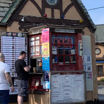 Frosty's Ice Cream - a man and a woman standing in front of an ice cream stand - Ice Cream & Frozen Yogurt Near Me - Lancaster, New York