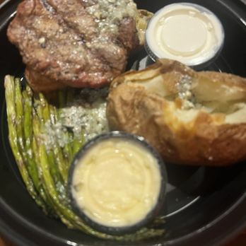 The Common Man Inn - Filet mignon (medium) with a baked potato (with butter and sour cream) and grilled asparagus. - Hotels Near Me - Claremont, New Hampshire The Common Man Inn - Filet mignon (medium) with a baked potato (with butter and sour cream) and grilled asparagus. - Hotels Near Me - Claremont, New Hampshire