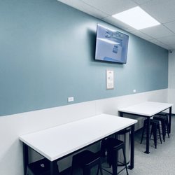 Soap Bar Laundromat - Folding tables and seating.