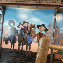 Crash Crawly's Adventure Fun Centre - A black cowboy with white kids the wife was cheating crash crawlies promotes cheating
