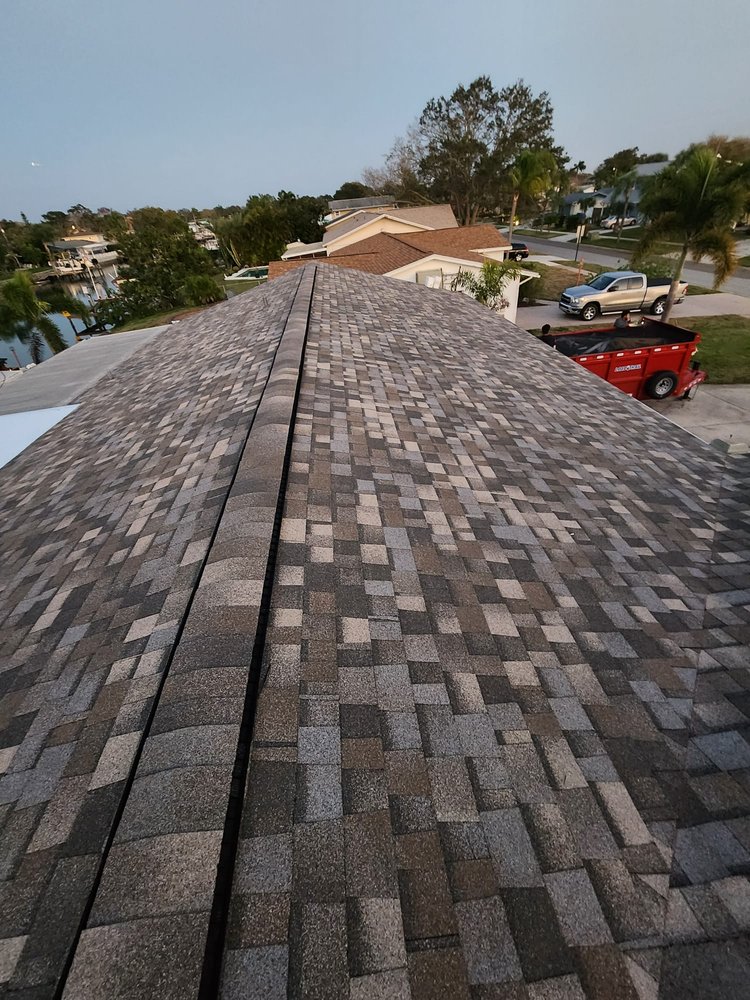 Slide of SolyMar Roofing