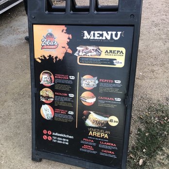 Zulia's Kitchen - And more items still to try on the other side of the menu standee - Venezuelan Near Me - San Antonio, Texas Zulia's Kitchen - And more items still to try on the other side of the menu standee - Venezuelan Near Me - San Antonio, Texas