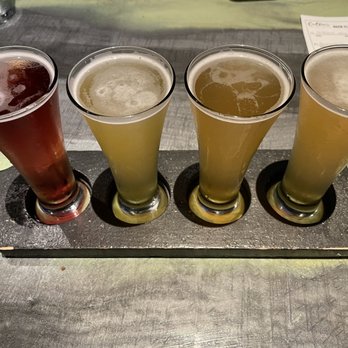 Colton's Social House - Left to right: Sour (which was not), Hawaiian Shirt IPA (okay), mango wheat (my lady liked it), Colton's pale (not much to it) - New American Near Me - Clovis, California Colton's Social House - Left to right: Sour (which was not), Hawaiian Shirt IPA (okay), mango wheat (my lady liked it), Colton's pale (not much to it) - New American Near Me - Clovis, California