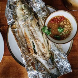Fish Cheeks - Grilled branzino with garlic peanut sauce