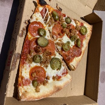 Tony's Pizza Bros - A Slice Pizza which is a quarter of a large pizza. Then cut in half - Pizza Near Me - Camarillo, California Tony's Pizza Bros - A Slice Pizza which is a quarter of a large pizza. Then cut in half - Pizza Near Me - Camarillo, California