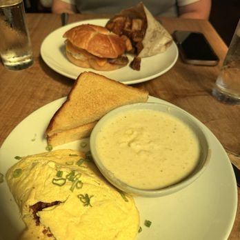 Church and Union - Local Farm Breakfast Sandwich Anson Mills Grits Home Fries Bacon/onion omlette - New American Near Me - Charleston, South Carolina Church and Union - Local Farm Breakfast Sandwich Anson Mills Grits Home Fries Bacon/onion omlette - New American Near Me - Charleston, South Carolina